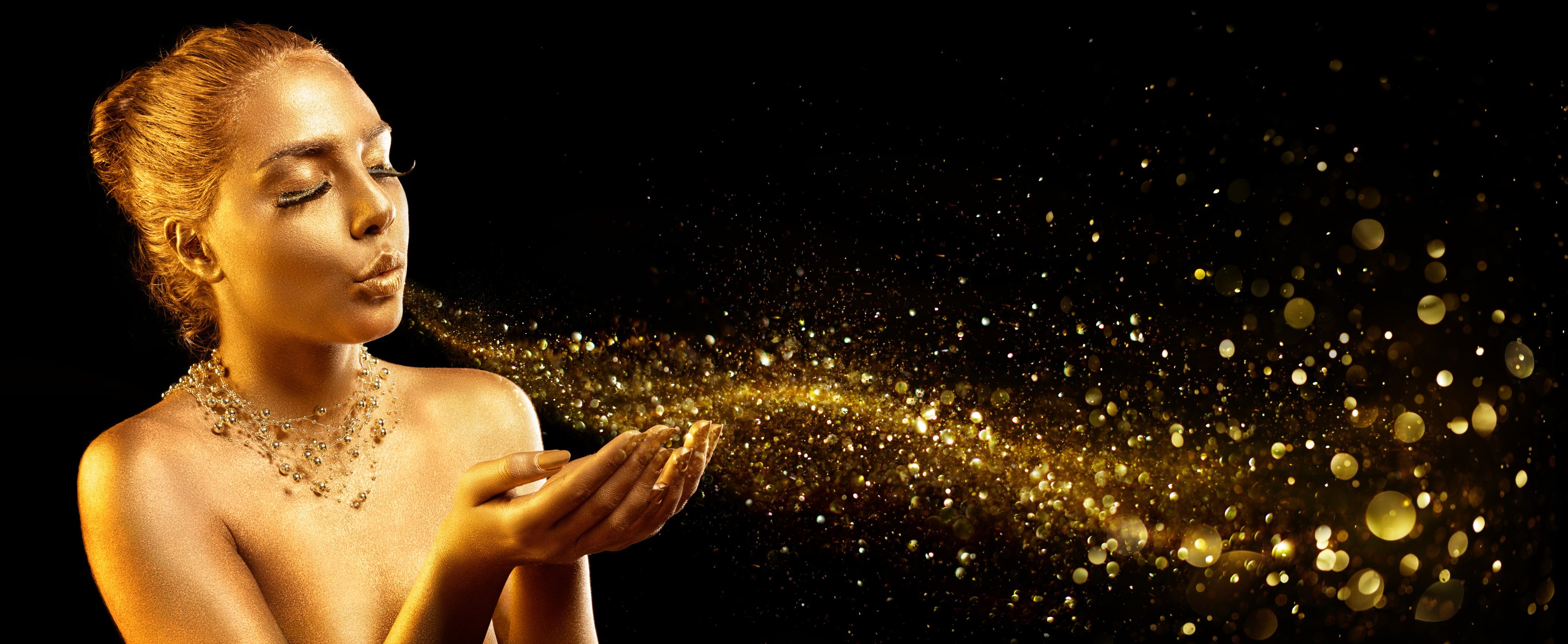 Gold Makeup - Fashion Model Blowing Golden Dust